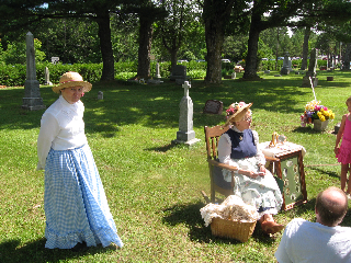 Emma
                                                          Karrow Bonack,
                                                          portrayed by
                                                          Diane Kliss,
                                                          descendant;
                                                          Nancy
                                                          Brewster, TLGS
                                                          member, tour
                                                          guide.