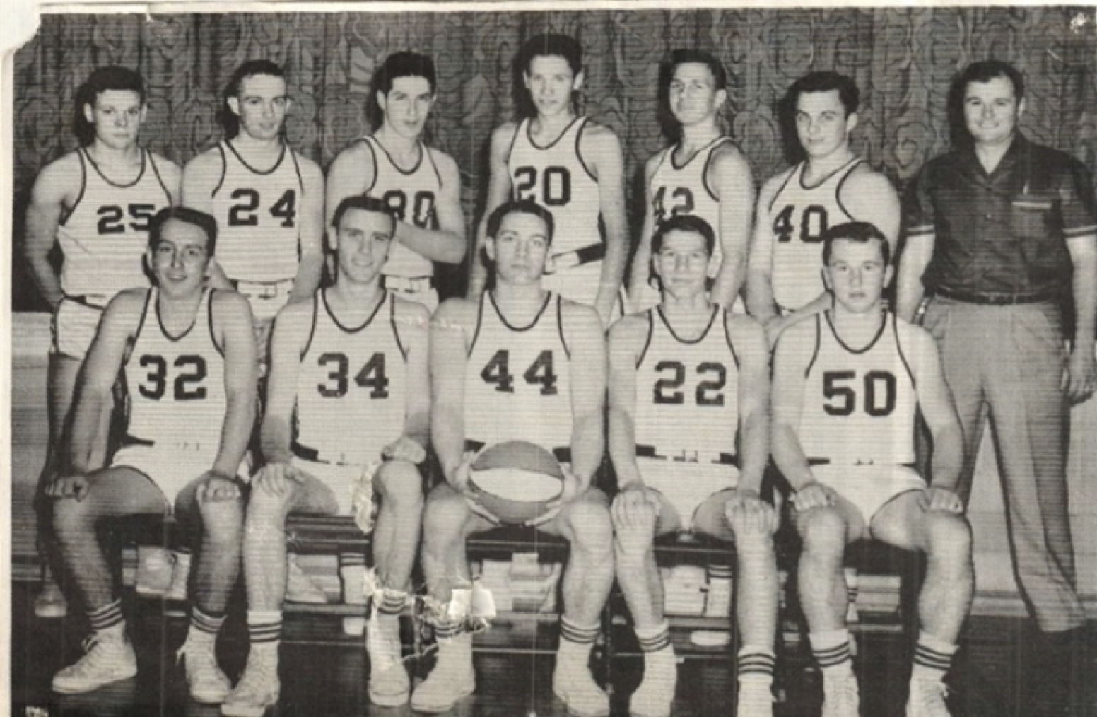 Bob Wojtusik
                        in high school basketball wearing number 44